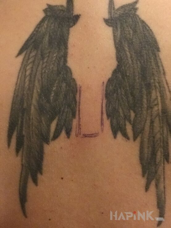 Tattoo Dramat z przed 10 lat ;))) in wings motif and graphic / illustrative style on the back