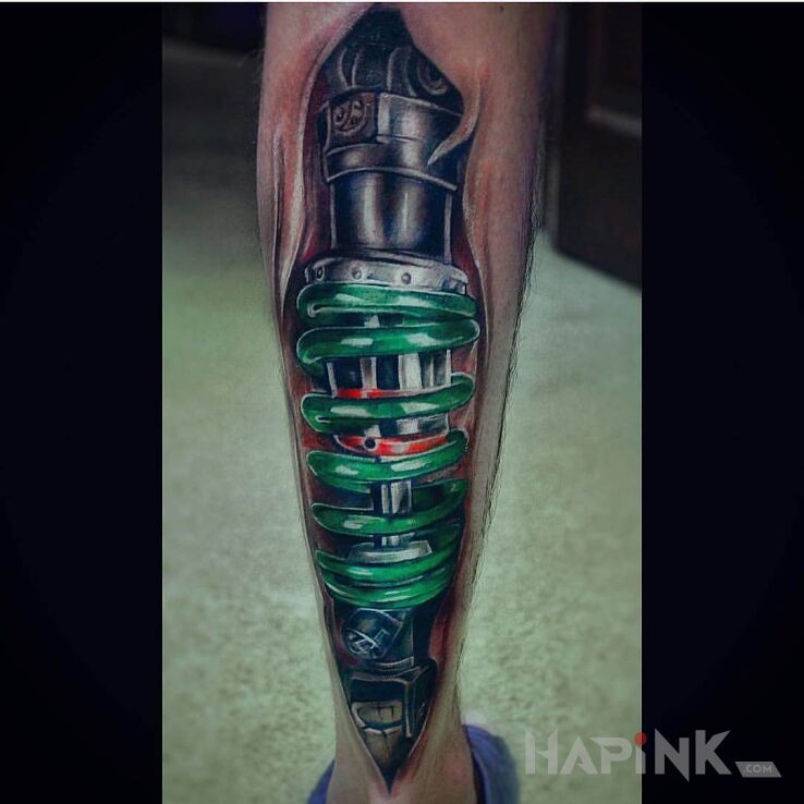 Tattoo Zielony resor in colorful motif and realistic style on the calf