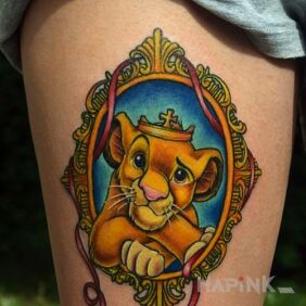 Tattoo Simba on the forearm motif: characters