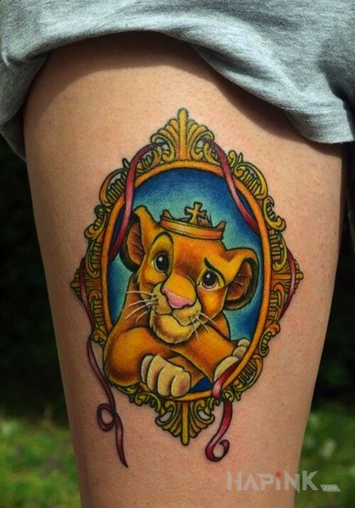 Tattoo Simba in characters motif on the forearm