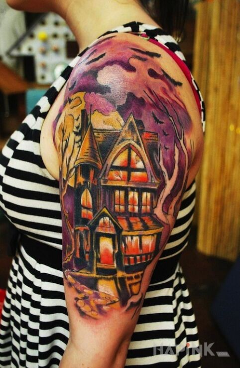 Tattoo Koszmarna willa in other motif on the upper arm