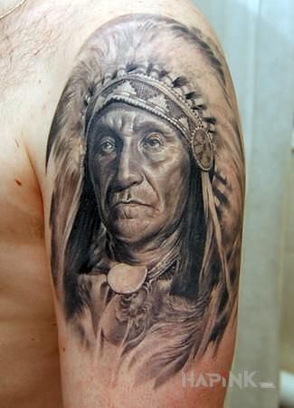 Tattoo Portret Indianina in black and gray motif and realistic style on the upper arm