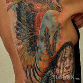 Tattoo Indian climate on the shoulder blades motif: colorful style: realistic