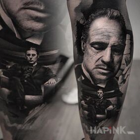 Tattoo Corleone on the calf motif: black and gray style: realistic
