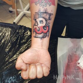 Tattoo Fighting Poland on the forearm motif: colorful style: graphic / illustrative