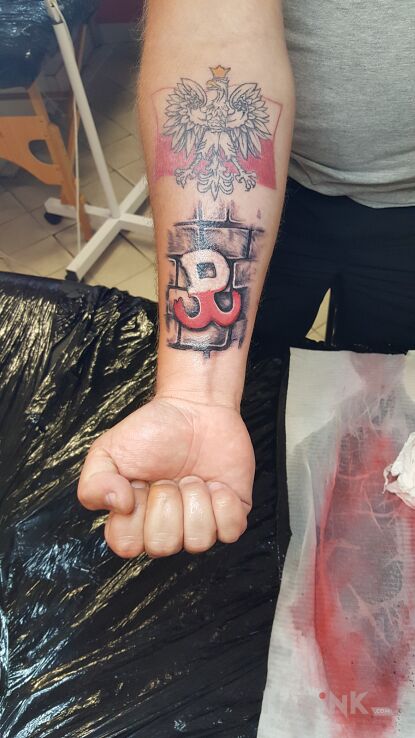 Tattoo Polska Walcząca in patriotic motif and graphic / illustrative style on the forearm
