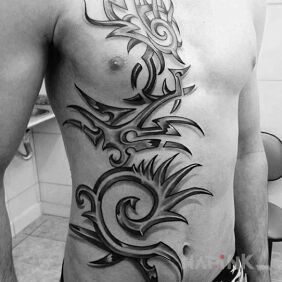 Tattoo Large tribal on the chest motif: black and gray style: tribal