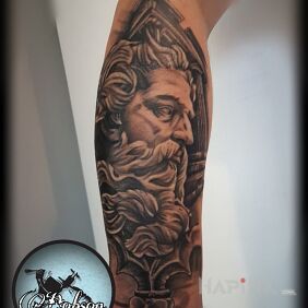 Tattoo Poseidon on the forearm motif: black and gray style: graphic / illustrative