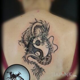 Tattoo Dragon with Yin Yang on the back motif: fantasy style: graphic / illustrative