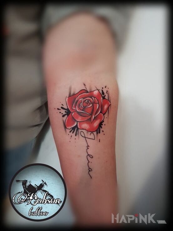 Tattoo Róża z imieniem in lettering motif on the forearm