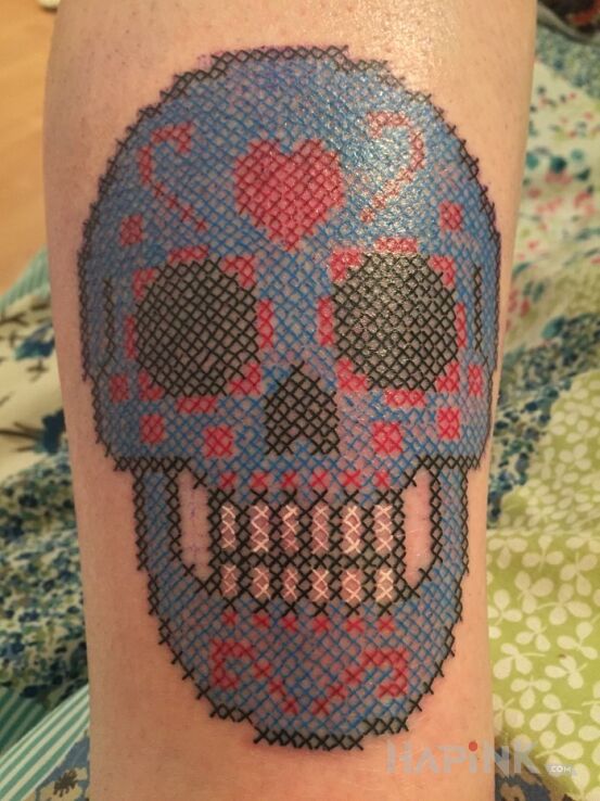 Tattoo Haftowana czaszka in skulls motif on the forearm