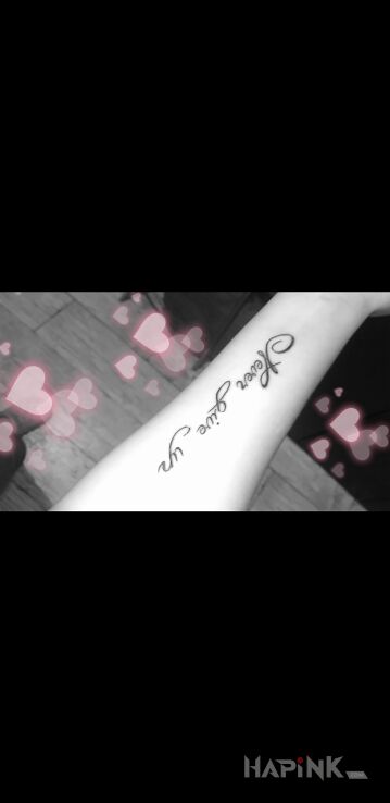 Tattoo Never in lettering motif on the forearm