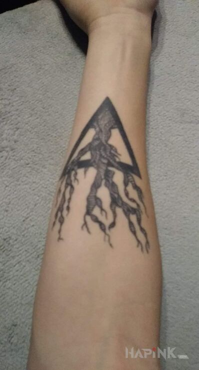 Tattoo #1 drzewkoo in black and gray motif and graphic / illustrative style on the forearm