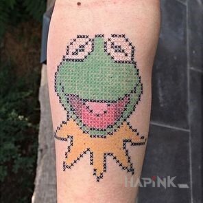 Tattoo Kermit  in characters motif on the forearm