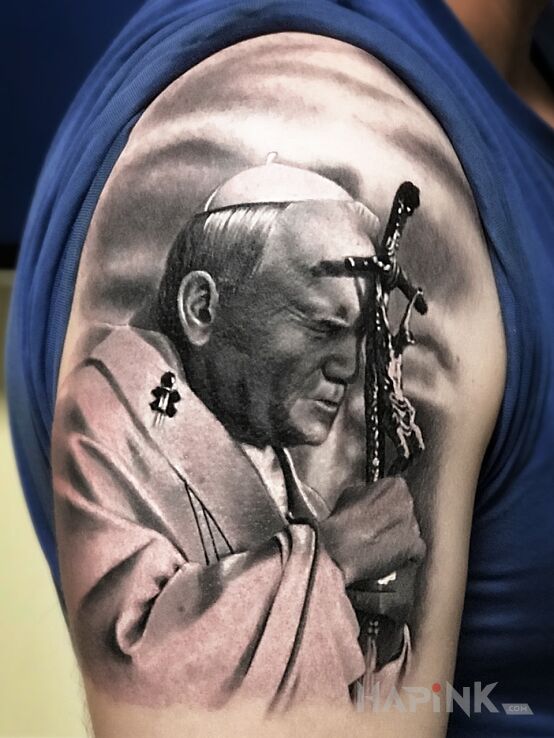 Tattoo Papież Jan Paweł in faces motif and realistic style on the upper arm