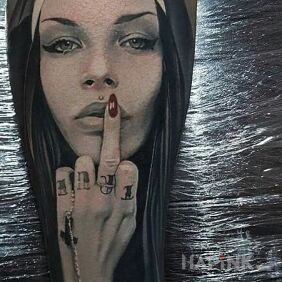 Tattoo Bad nun on the calf motif: black and gray style: realistic