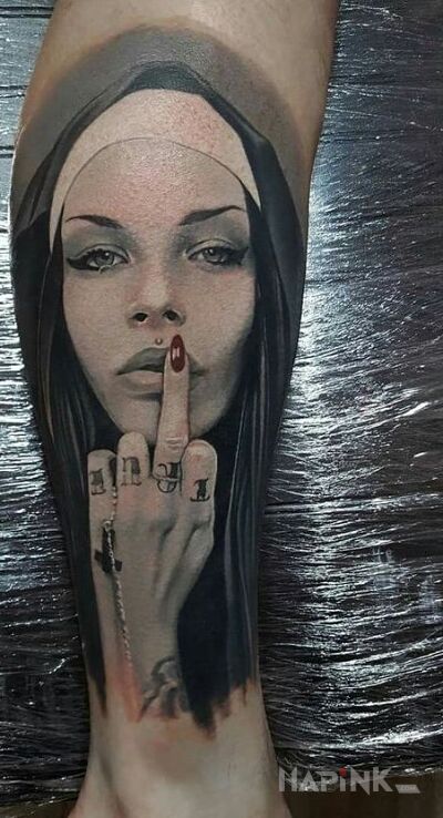 Tattoo Bad nun in black and gray motif and realistic style on the calf