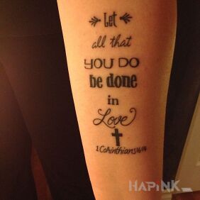 Tattoo In love on the forearm motif: lettering style: calligraphy