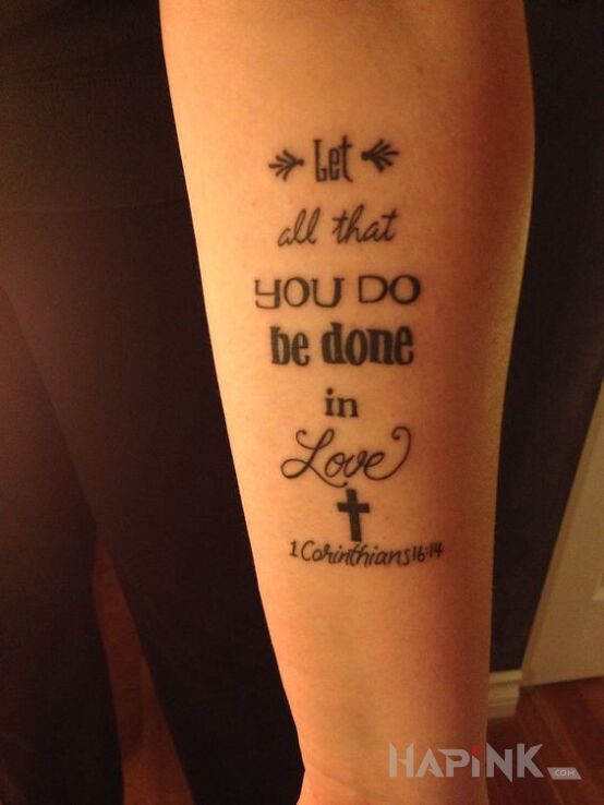 Tattoo W milosci in lettering motif and calligraphy style on the forearm