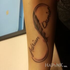 Tattoo Infinity on the forearm motif: black and gray style: graphic / illustrative
