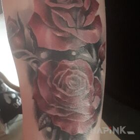 Tattoo Roses on the forearm motif: colorful style: realistic
