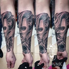 Tattoo LA Lolita on the forearm motif: faces style: realistic