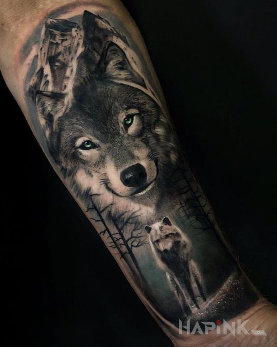 Tattoo Uśmiechnięty wilk in animals motif and realistic style on the forearm