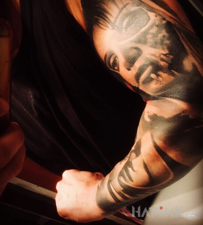 Tattoo Rekaw in sleeves motif and realistic style on the forearm