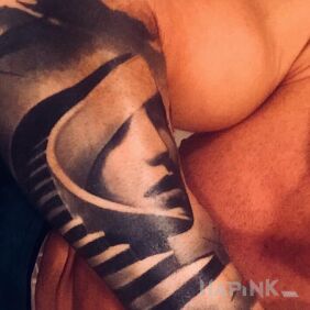 Tattoo Woman on the forearm motif: faces style: surrealistic