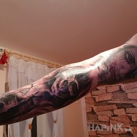 Tattoo Czacha on the forearm motif: faces style: realistic