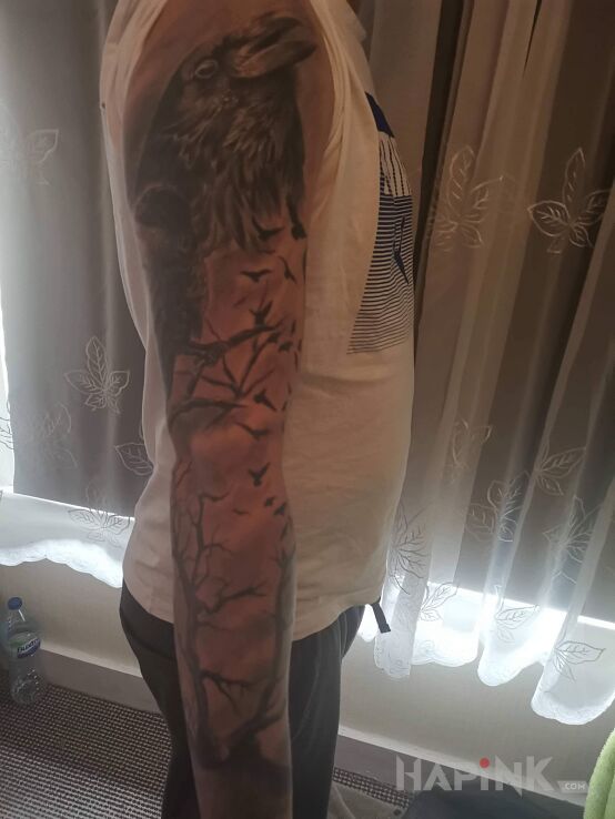 Tattoo Ptaki in sleeves motif and realistic style on the forearm