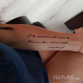 Tattoo Subtitles on the forearm motif: lettering style: calligraphy