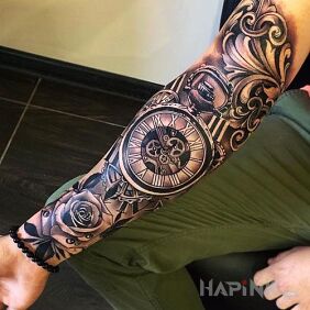 Tattoo Watchmaker on the upper arm motif: black and gray style: realistic