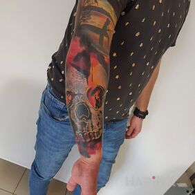 Tattoo The symbol of the music I love, on the background of the skull ...(Trance). on the forearm motif: colorful style: realistic