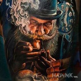 Tattoo Grandpa on the upper arm motif: colorful style: realistic