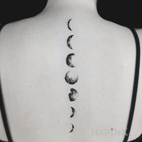 Tattoo Phases of the moon on the back motif: black and gray style: graphic / illustrative