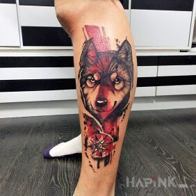 Tattoo Wolf on the calf motif: animals style: trash polka