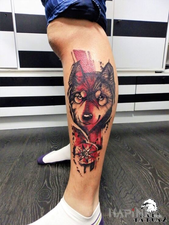Tattoo Wilk in colorful motif and trash polka style on the calf