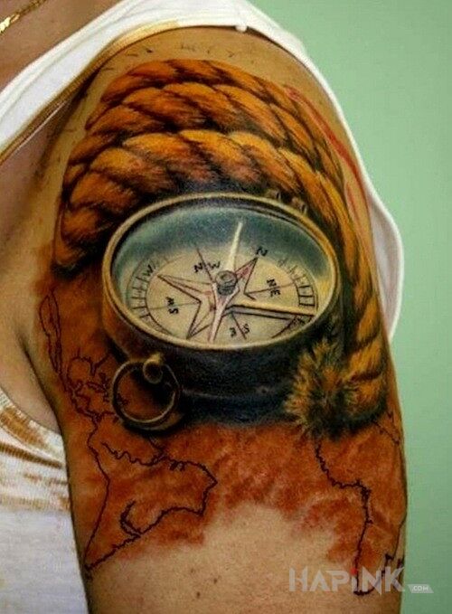 Tattoo Kompas in other motif on the upper arm