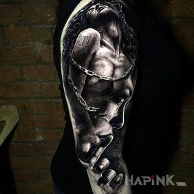 Tattoo Captured in chains on the upper arm motif: characters style: realistic