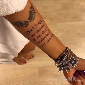 Tattoo Own choices on the forearm motif: black and gray style: calligraphy