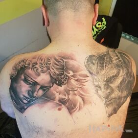 Tattoo Angel and Satan on the shoulder blades motif: black and gray style: realistic