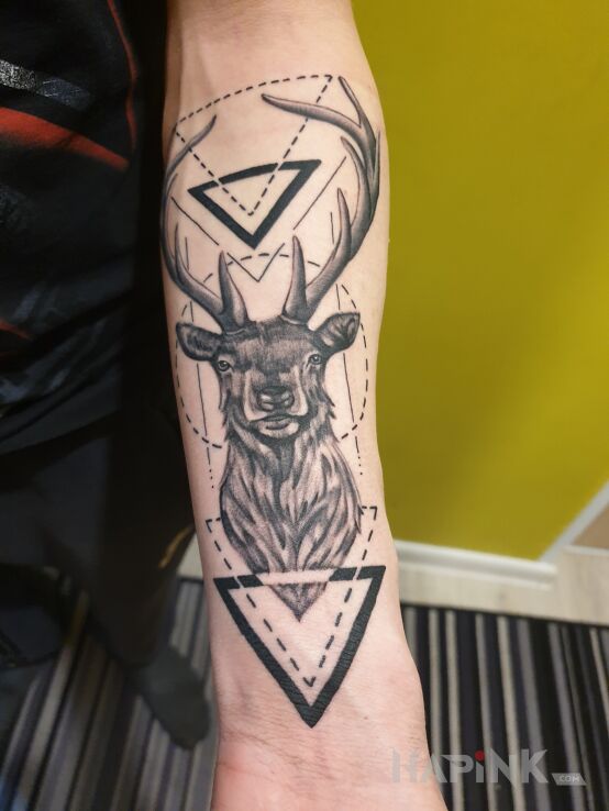 Tattoo Pierwszy ale nie ostatni ? in black and gray motif and graphic / illustrative style on the forearm
