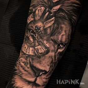 Tattoo Lion of time on the forearm motif: animals style: realistic
