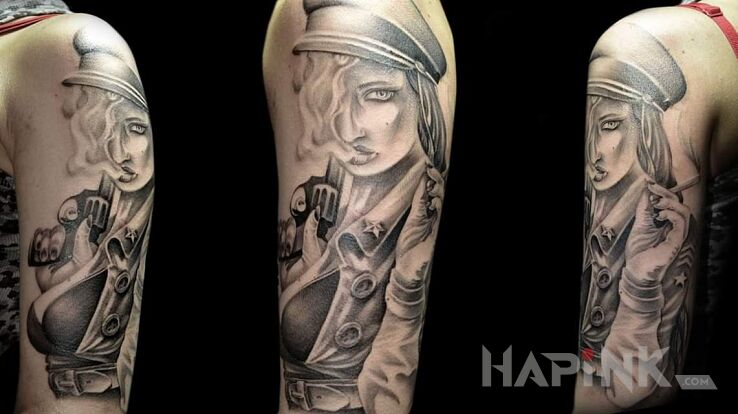Tattoo Kobieta z charakterkiem in faces motif and realistic style on the upper arm