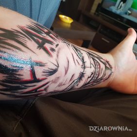 Tatuaż Joker na przedramieniu motyw: twarze styl: graficzne / ilustracyjne