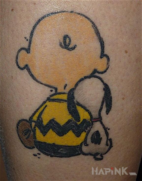 Tattoo Chłopiec i pies in characters motif on the leg
