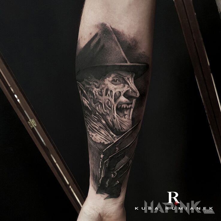 Tattoo Freddy Krueger in characters motif and realistic style on the forearm