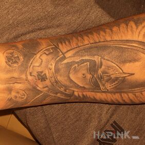 Tattoo Hussars on the forearm motif: wings style: graphic / illustrative