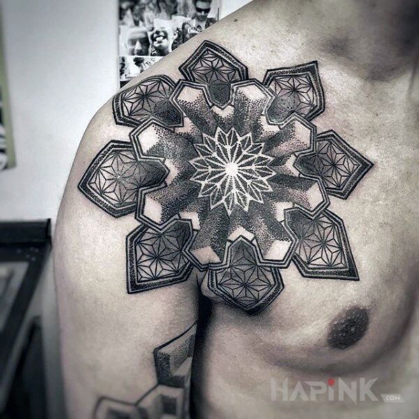 Tattoo Mandale in mandalas motif and geometric style on the collarbone